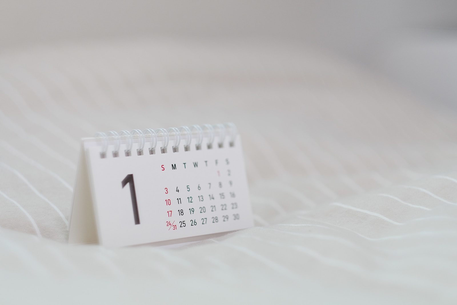 white calendar on white textile